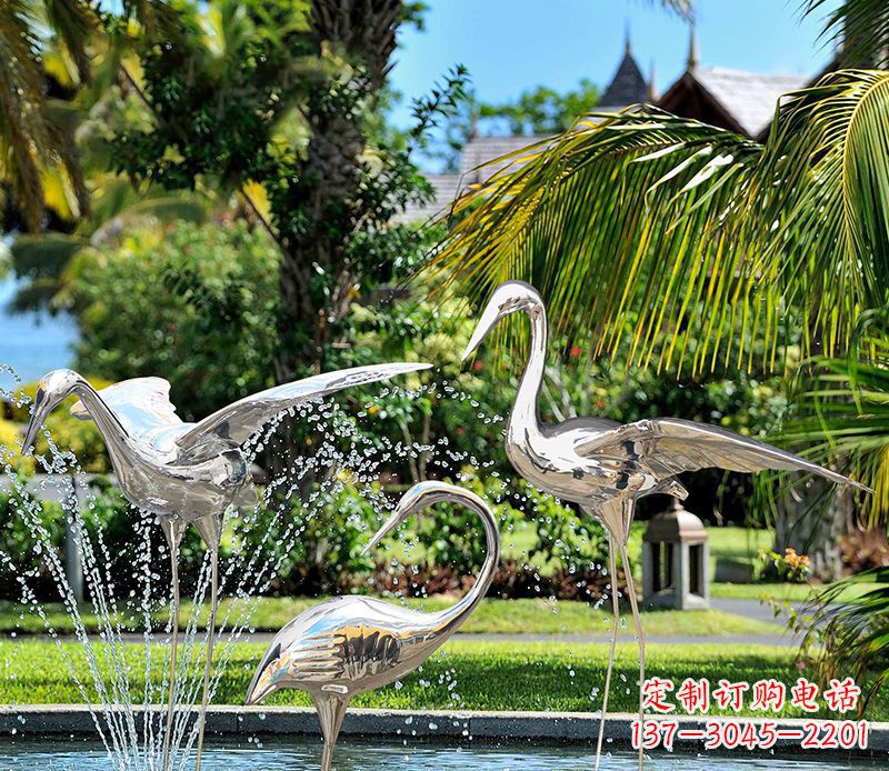 绍兴鹤雕塑-公园池塘不锈钢镜面抽象喷泉中的鹤雕塑