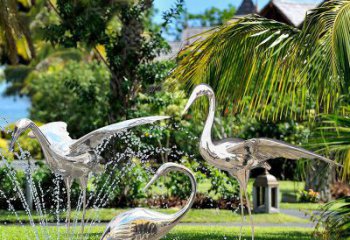 绍兴鹤雕塑-公园池塘不锈钢镜面抽象喷泉中的鹤雕塑